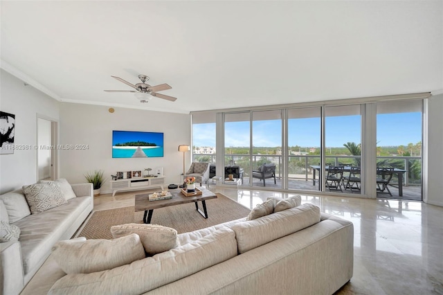 living room featuring crown molding, expansive windows, and ceiling fan