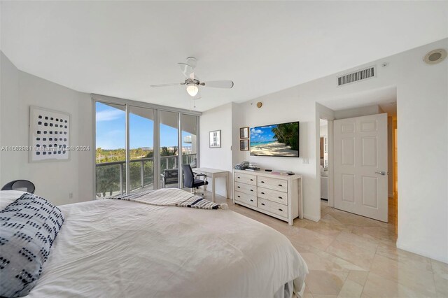 bedroom with access to exterior and ceiling fan