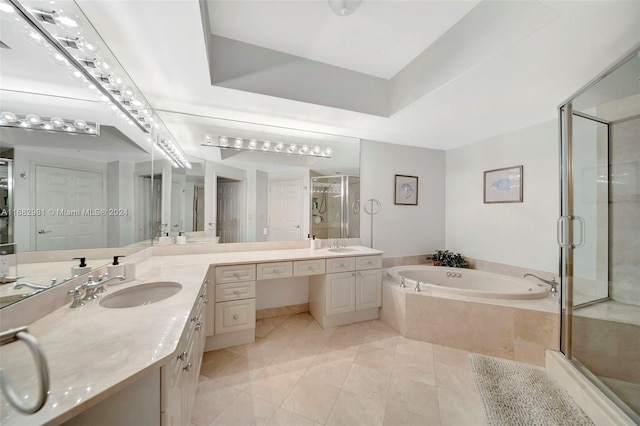 bathroom featuring vanity, separate shower and tub, and tile patterned floors