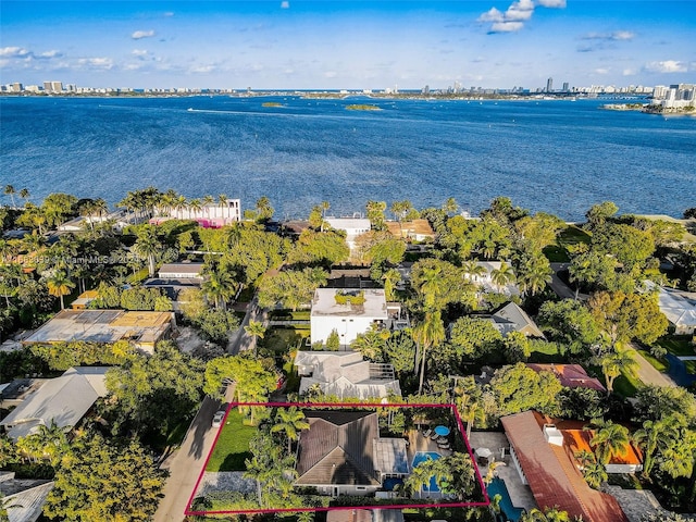 birds eye view of property featuring a water view