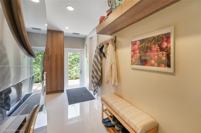 mudroom with tile patterned floors