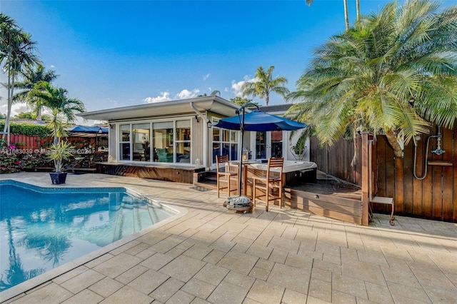 view of pool featuring a patio