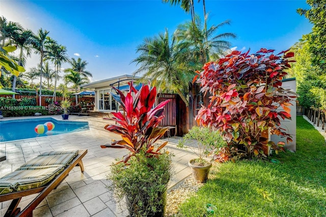 view of pool featuring a patio