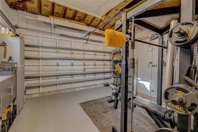 exercise room featuring concrete floors