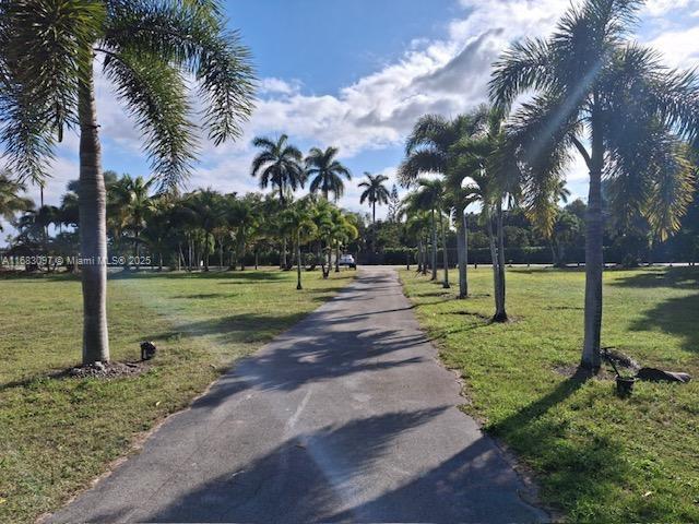 view of community featuring a lawn