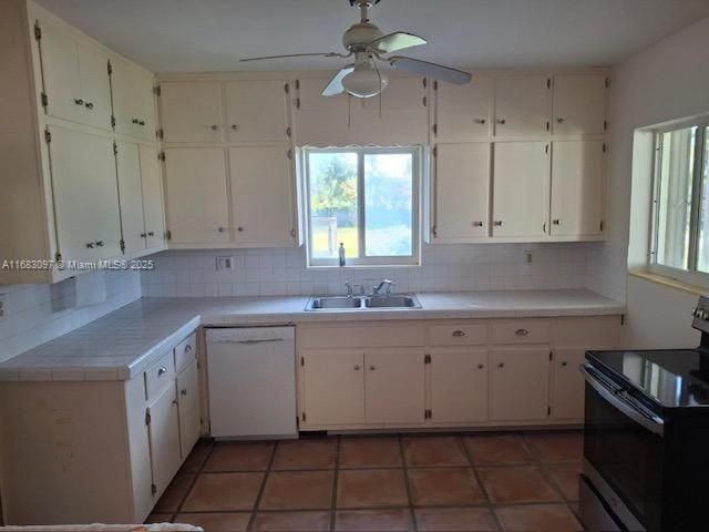 kitchen with white cabinetry, sink, dishwasher, and black range with electric cooktop