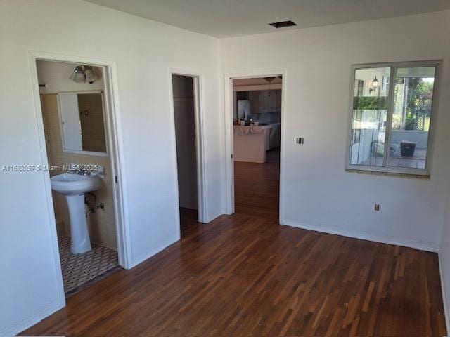 interior space featuring dark hardwood / wood-style flooring