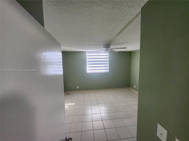 1913 S Ocean Dr Unit 423, Hallandale Beach, FL 33009 - empty room featuring ceiling fan, a textured ceiling, and light tile patterned floors