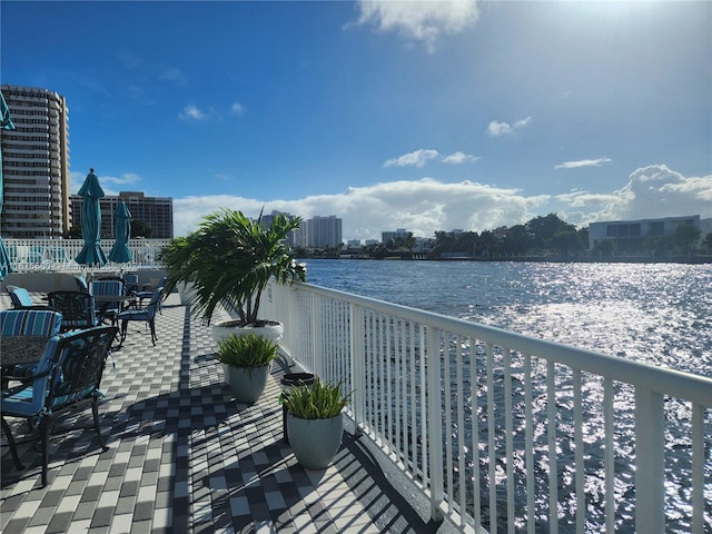 balcony featuring a water view