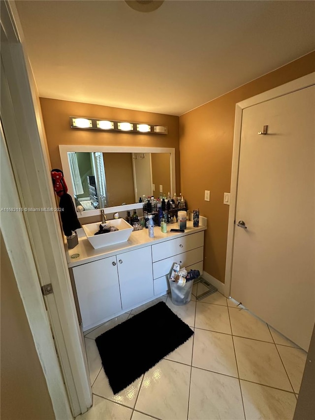 bathroom featuring vanity and tile patterned flooring