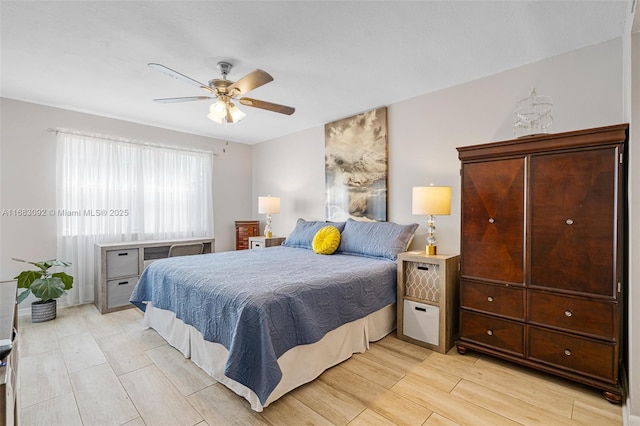 bedroom featuring ceiling fan and light hardwood / wood-style flooring