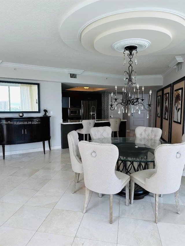 dining area featuring a notable chandelier, tile patterned flooring, and crown molding