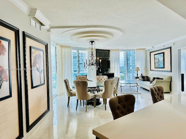 dining area with ornamental molding, a chandelier, a textured ceiling, and light tile patterned floors