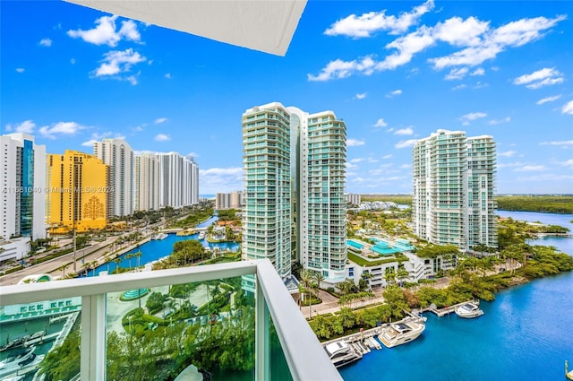 balcony featuring a water view