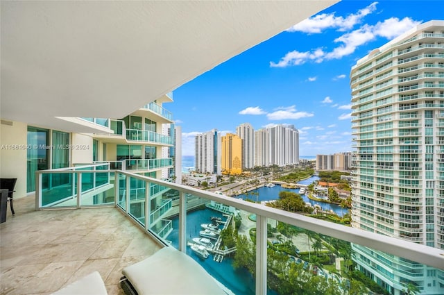 balcony featuring a water view