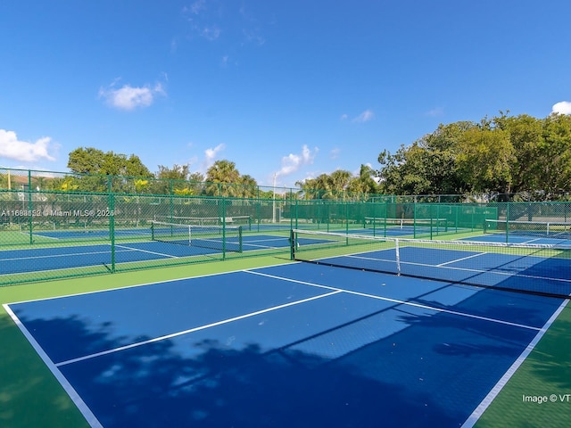 12800 SW 7th Ct Unit 313G, Pembroke Pines, FL 33027 - view of tennis court with fence