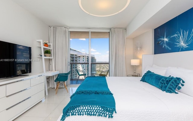 bedroom with light tile patterned floors