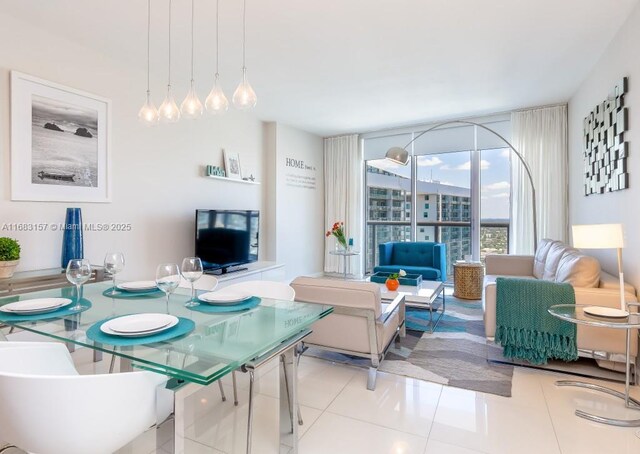 485 Brickell Ave Unit 3906, Miami, FL 33131 - tiled dining space featuring floor to ceiling windows