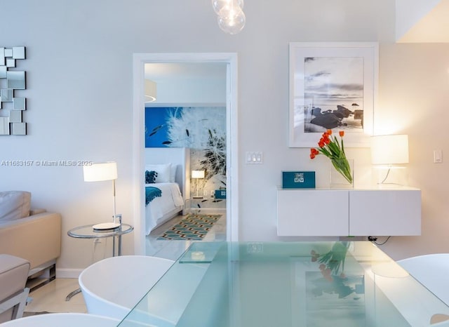 485 Brickell Ave Unit 3906, Miami, FL 33131 - dining space featuring baseboards