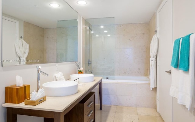 485 Brickell Ave Unit 3906, Miami, FL 33131 - bathroom featuring double vanity, recessed lighting, tiled shower / bath, and tile patterned floors