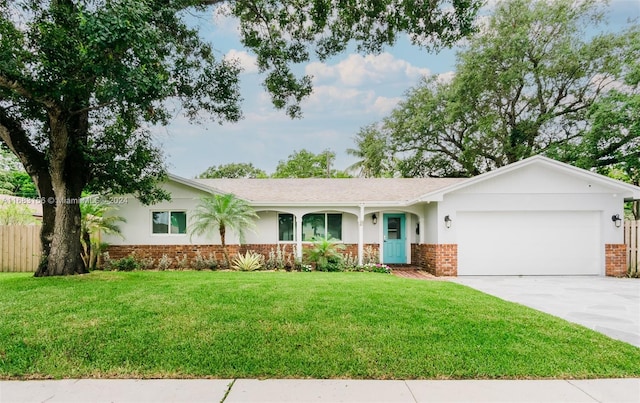 single story home with a front lawn and a garage