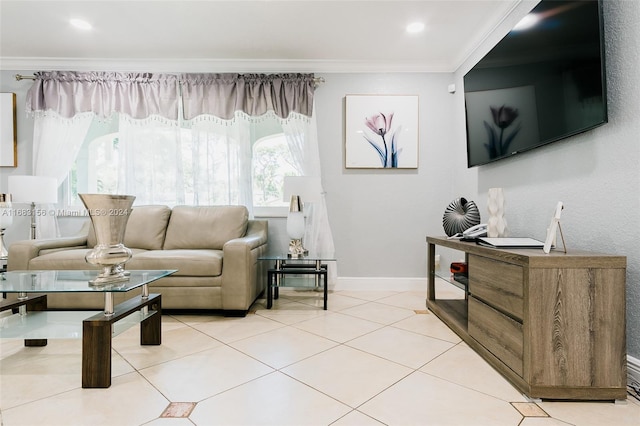 living room with crown molding and light tile patterned floors