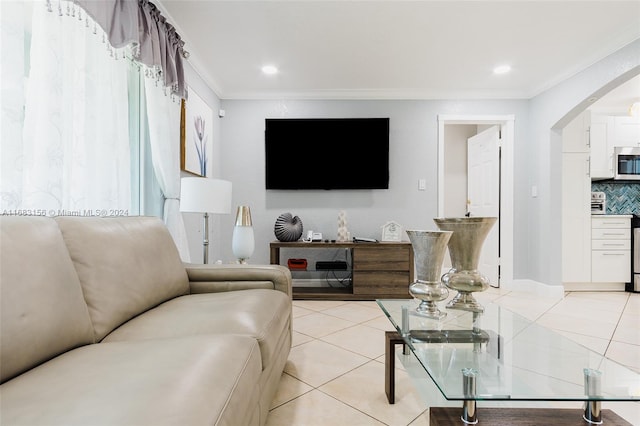 tiled living room featuring crown molding