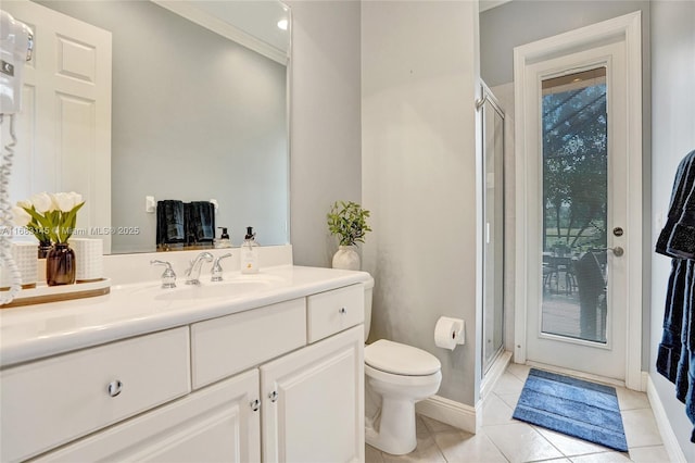 bathroom featuring vanity, walk in shower, tile patterned floors, and toilet