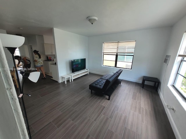 living room with plenty of natural light