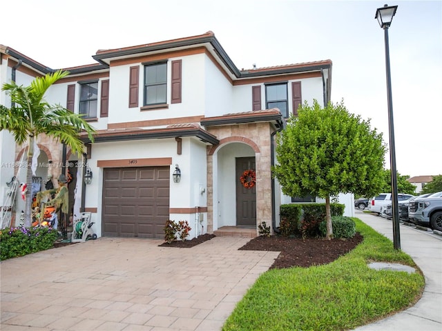 view of front of home with a garage