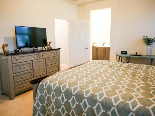 bedroom with light carpet