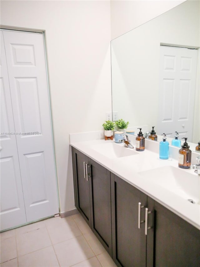 bathroom with vanity and tile patterned floors