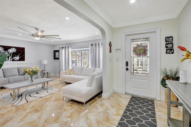 foyer entrance featuring crown molding, ceiling fan, and light tile patterned floors