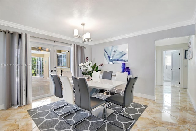 dining area featuring french doors, crown molding, and an inviting chandelier