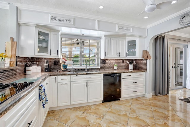 kitchen with black appliances, sink, ornamental molding, white cabinetry, and decorative backsplash