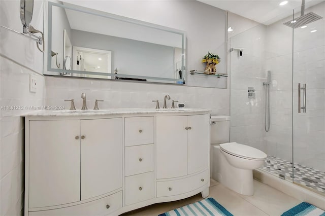 bathroom featuring vanity, tasteful backsplash, toilet, and walk in shower