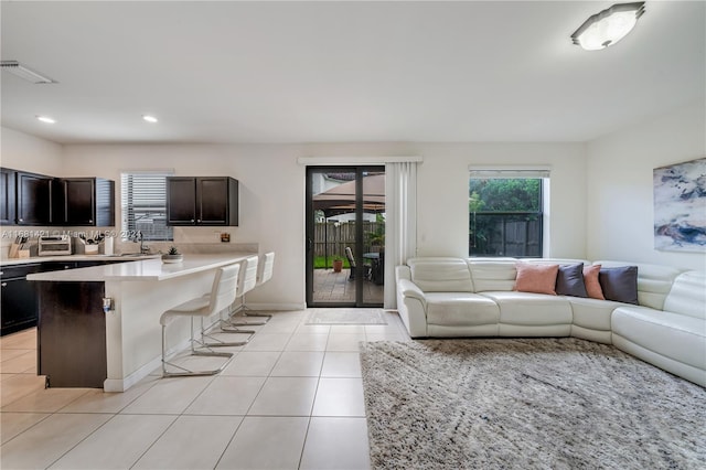 11790 SW 251st St, Homestead, FL 33032 - living area featuring light tile patterned floors and recessed lighting
