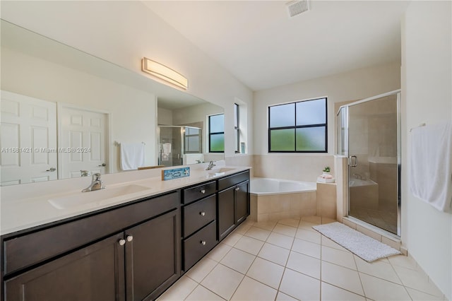 bathroom with vanity, tile patterned floors, and independent shower and bath