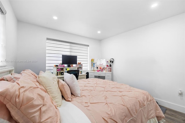 bedroom featuring hardwood / wood-style floors