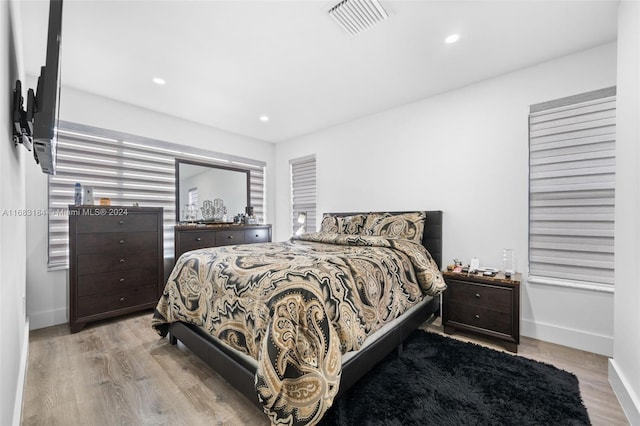 bedroom featuring light wood-type flooring