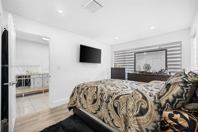 bedroom featuring light hardwood / wood-style flooring