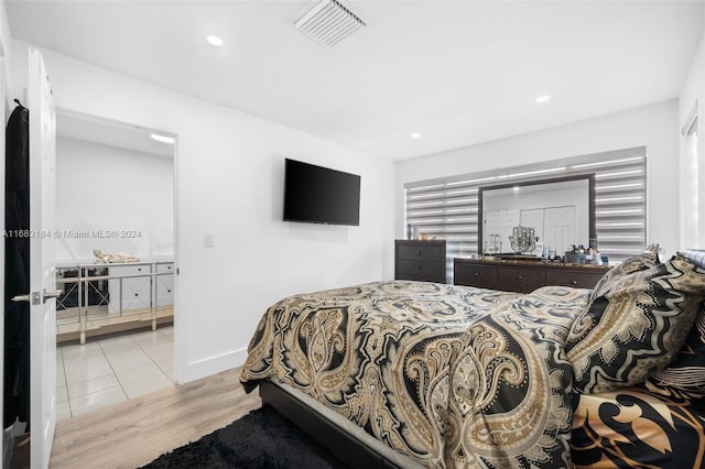 811 W 33rd St, Hialeah, FL 33012 - bedroom with wood finished floors and recessed lighting