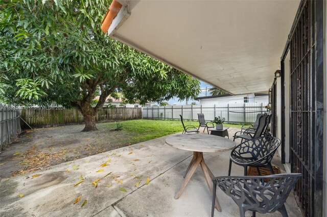 811 W 33rd St, Hialeah, FL 33012 - fenced backyard featuring a patio area