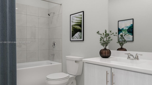 full bathroom with toilet, shower / bath combo, and vanity