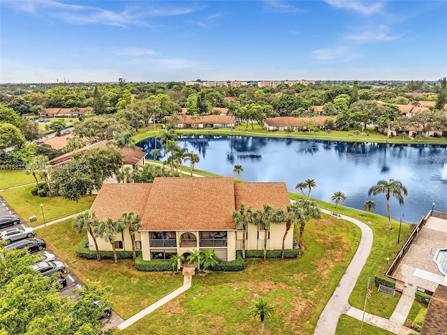 drone / aerial view with a water view