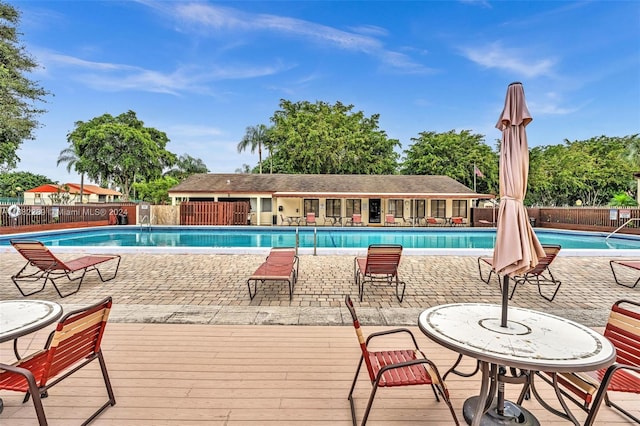 view of swimming pool featuring a patio area