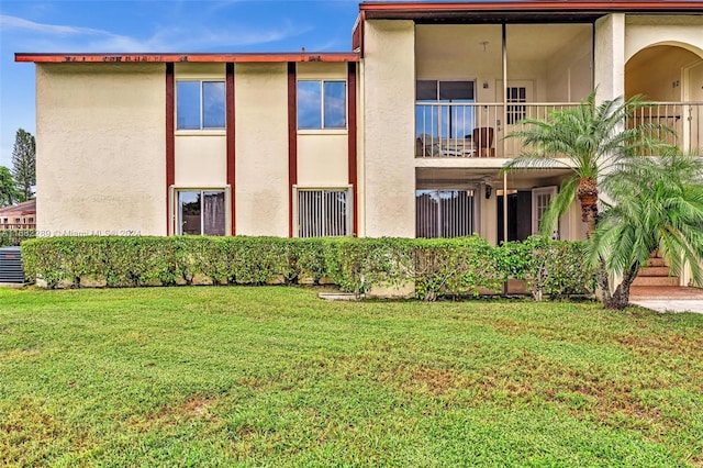 view of property with central AC unit