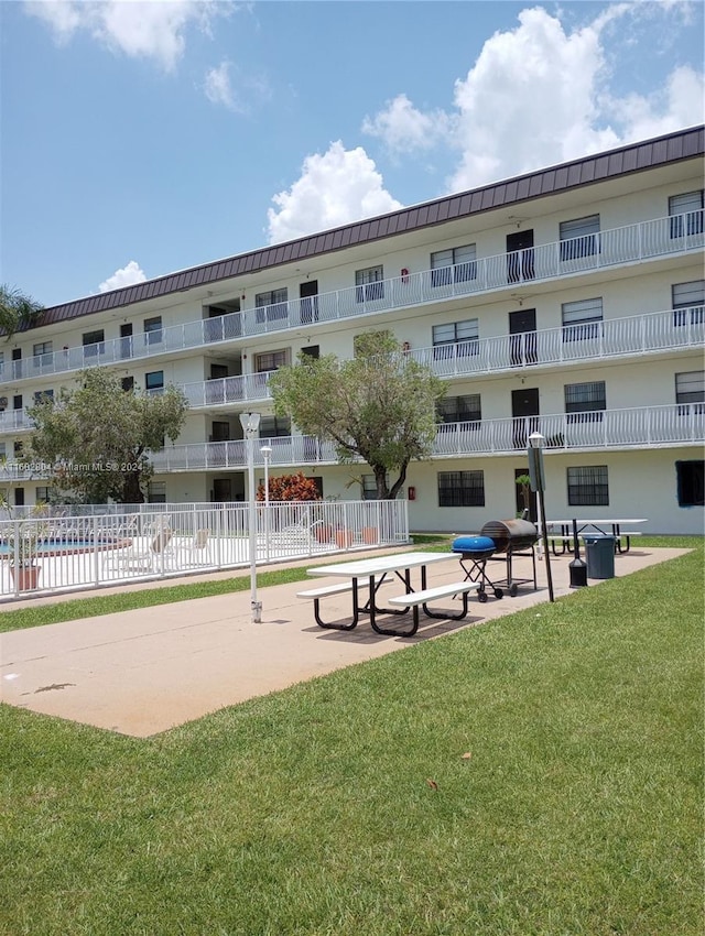 view of community with a lawn