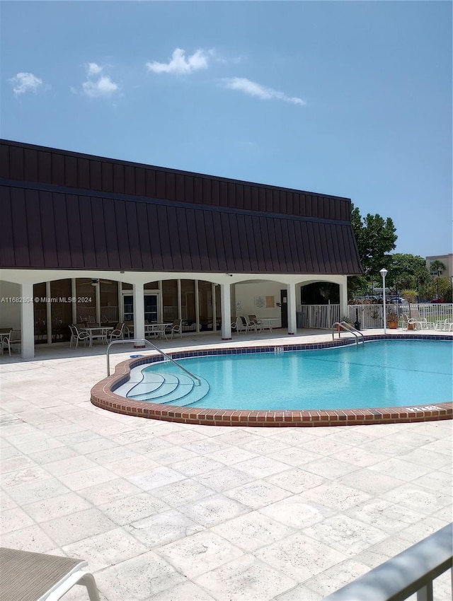 view of pool with a patio