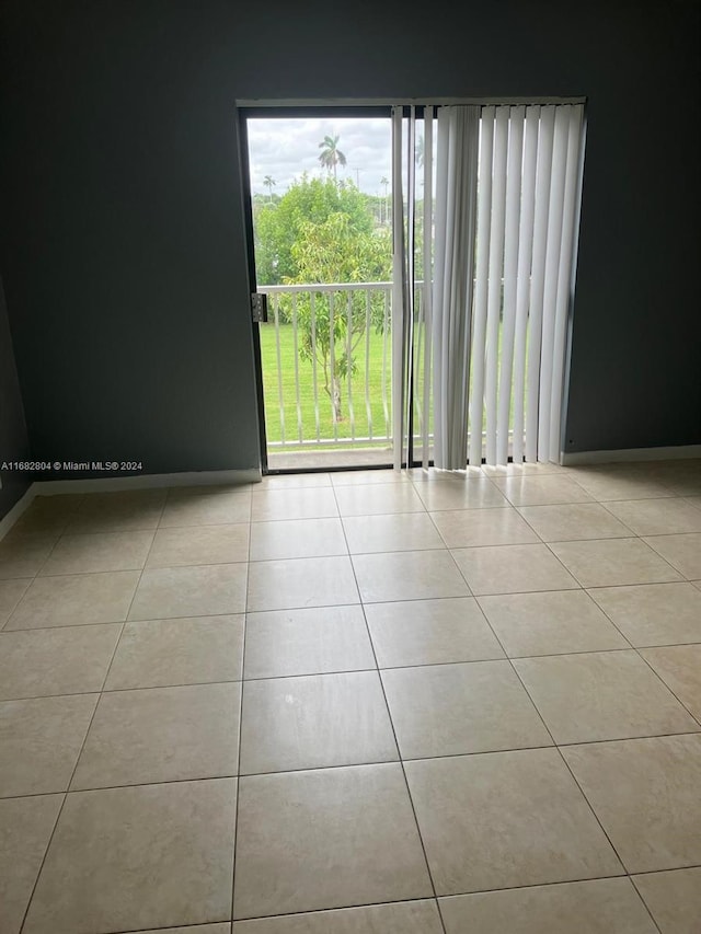 view of tiled spare room